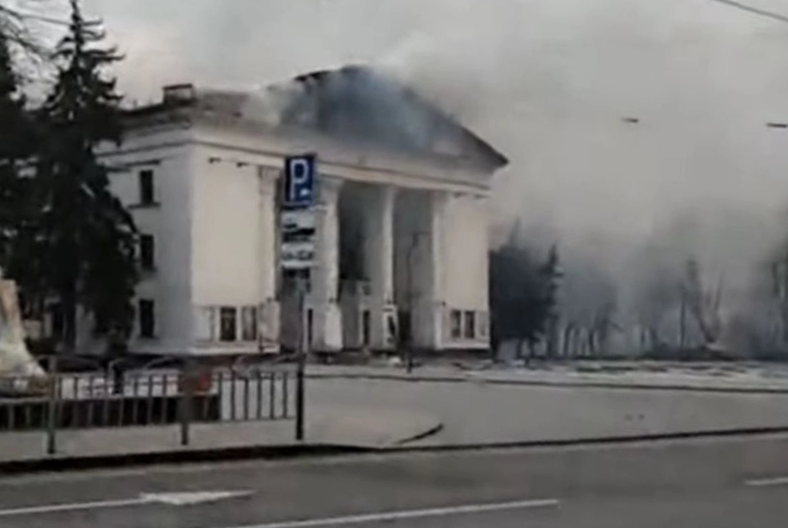 The frontal part of the theater is still burning, with the sculptural group on the tympanum turning black from the flame. Screenshot from the video of anonymous witness. ©Center for Spatial Technologies