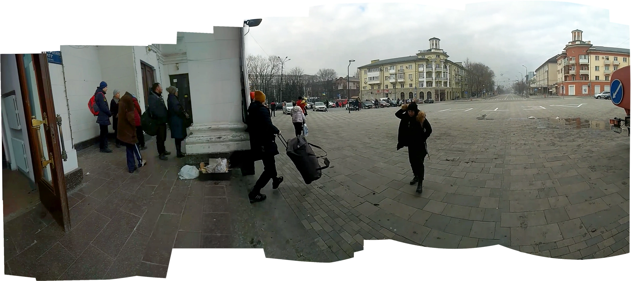 Panorama from the video, capturing people leaving the theater in the morning of 15.03.2022 on the eve of the attack. 