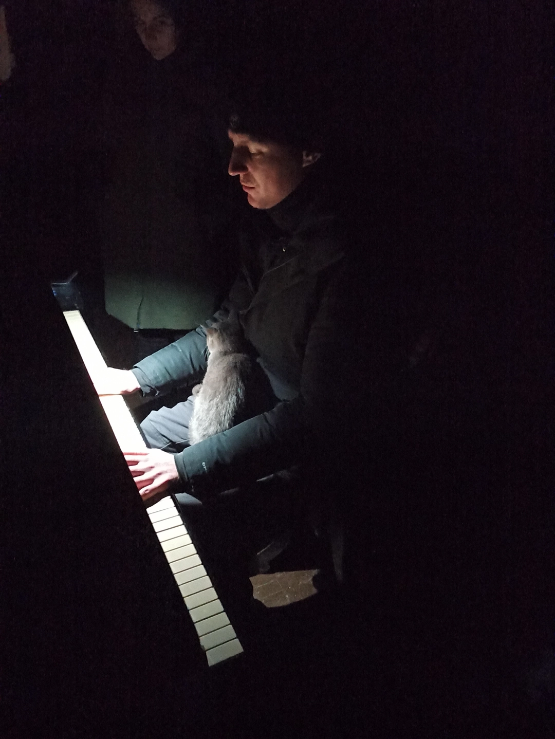 The theater's residents gathered around the piano on the theater stage. It was in this space that the explosion occurred on the morning of March 16. ©Olha Korniichuk