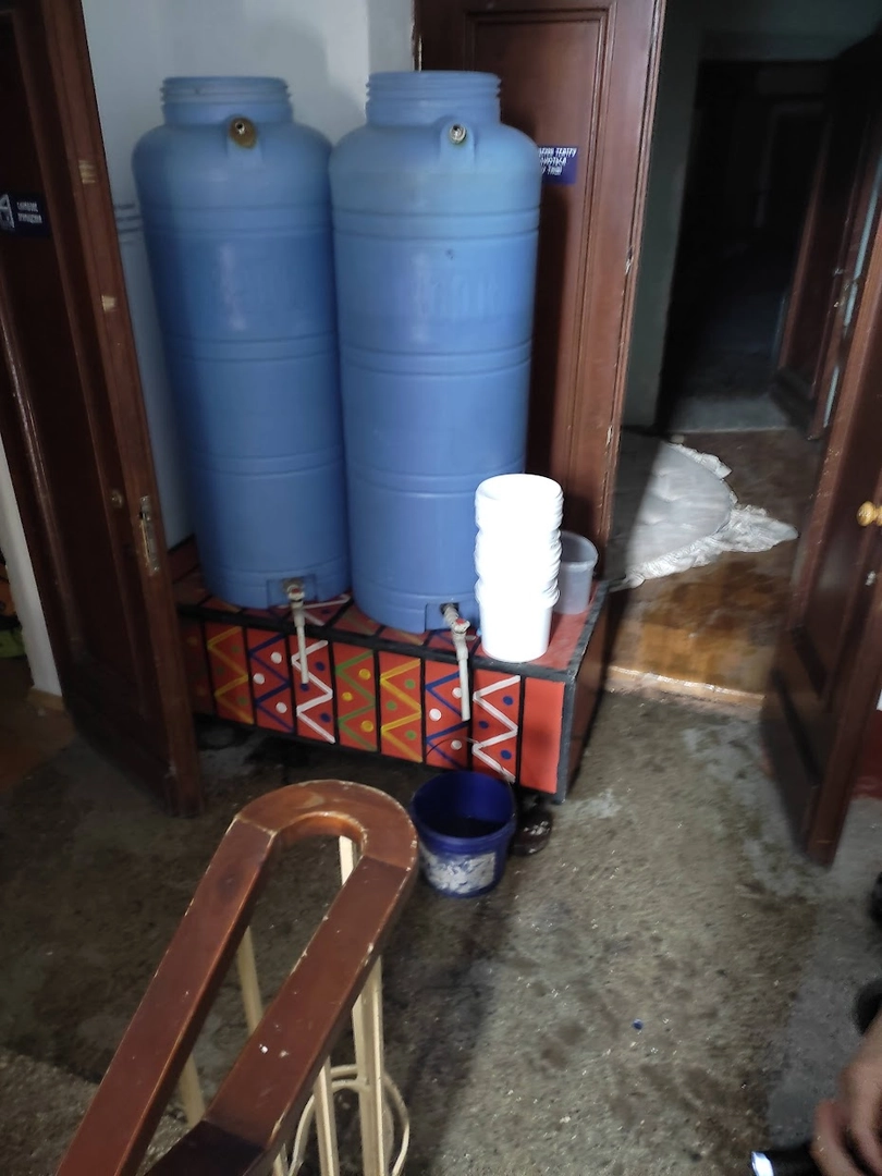 Water tanks inside the theater, located next to the entrance to the field kitchen. ©Lev Sandalov